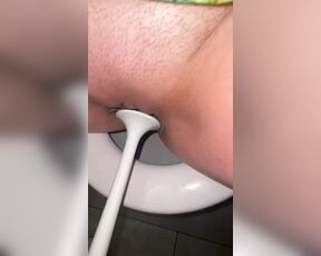 Licking public toilets in the hotel and playing with toilet brush