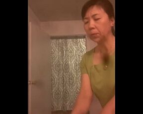 Asian massage parlor looks upset to be jerking my beautiful cock ????