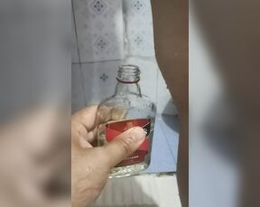 Bhabi pissing in rum bottle