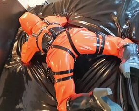 OnlyFans teaser - Heavyrubber latex lady in rainwear and harness!