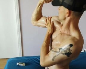 Oil on ripped body and flexing with moaning